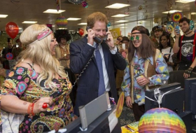 Britain`s Prince Harry turns trader for charity day
